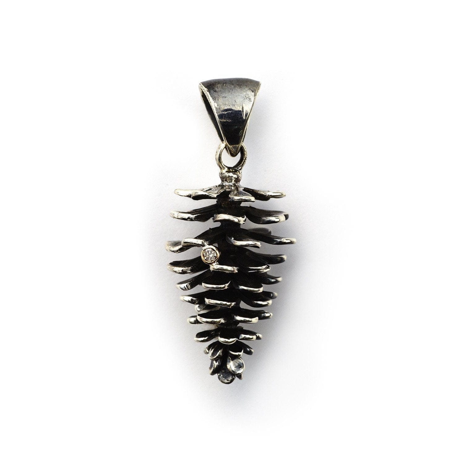 large nordic pine cone pendant jewellery of silver with a diamond